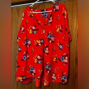 Women’s RUE 21 size 4x short sleeve flower print blouse.